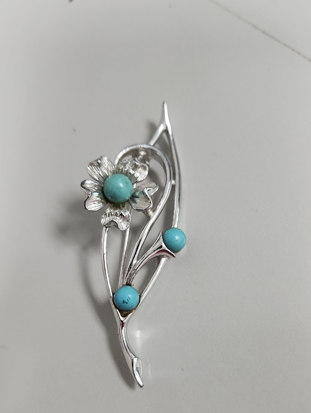 Silver Floral Brooch with Turquoise Accent